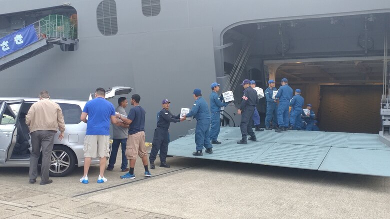 US Sailors share care packages with Japanese shipmates