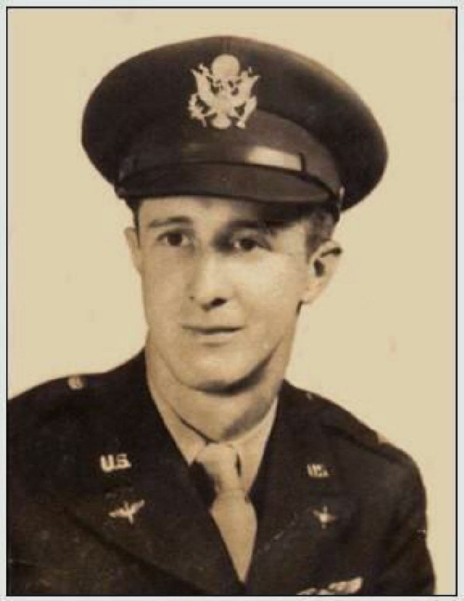 U.S. Army Air Corps 1st Lt. John D. Crouchley, poses for an official photo during World War II. Crouchley was assigned to the 828th Bombardment Squadron, 485th Bombardment Group, Foggia, Italy, and went into combat in May 1944. His aircraft was shot down over Bulgaria June 28, 1944, when he and his crew were returning from a bombing mission over Romania. He was missing in action for 73 years until his partial remains were discovered by a team from the Defense POW/MIA Accounting Agency in 2017 and positively identified in September 2018. (Courtesy photo)