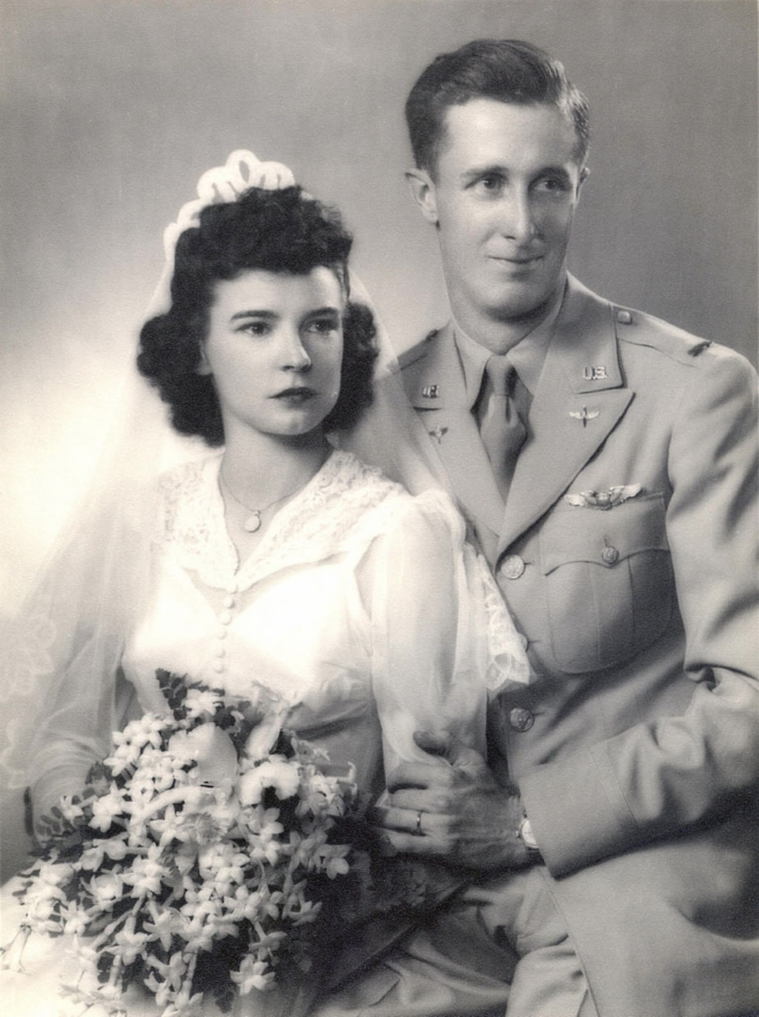 U.S. Army Air Corps 1st Lt. John D. Crouchley and his wife Dorothy, pose for their wedding photo in 1943. Crouchley was assigned to the 828th Bombardment Squadron, 485th Bombardment Group, Foggia, Italy, and went into combat in May 1944. His aircraft was shot down over Bulgaria June 28, 1944, when he and his crew were returning from a bombing mission over Romania. He was missing in action for 73 years until his partial remains were discovered by a team from the Defense POW/MIA Accounting Agency in 2017 and positively identified in September 2018. Crouchley’s wedding ring, visible in the photo and engraved with his wife’s initials, was one of the personal items found that was used to identify him. (Courtesy photo)