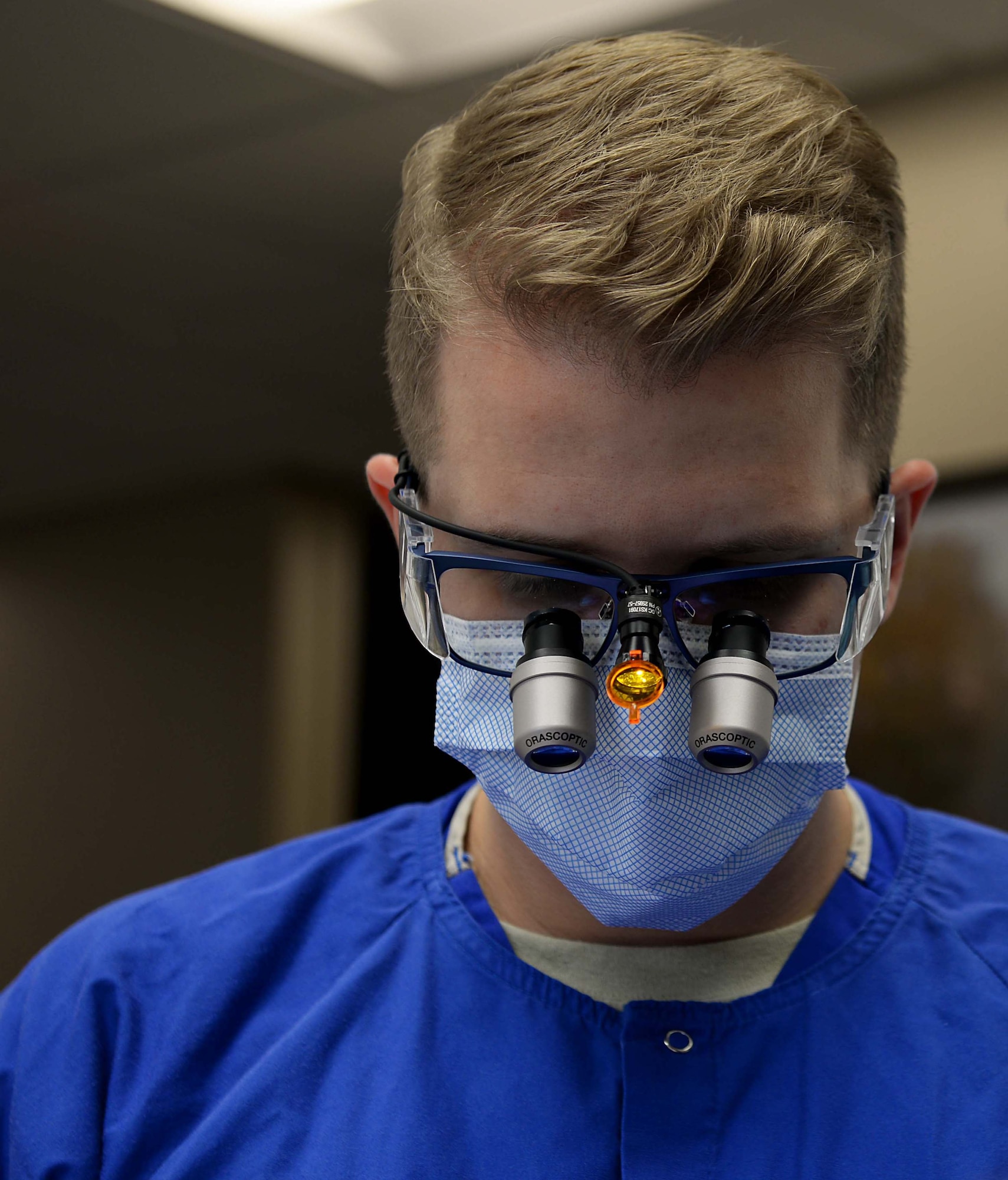 Capt. Travis Wagner, 14th Medical Operations Squadron general dentist, operates on a patient Nov. 7, 2018, on Columbus Air Force Base, Mississippi. The dental flight focuses mainly on good oral habits to aide patients in keeping their mouth clean and healthy enough that it won’t cause issues in the long run. (U.S. Air Force photo by Airman Hannah Bean)