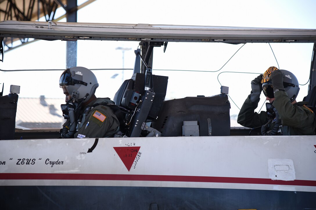Second Lt. Austin Anderson, 41st Flying Training Squadron student pilot, and Capt. Joseph Sornsin, 41st FTS instructor pilot, prepare for a flight Nov. 6, 2018, on Columbus Air Force Base, Mississippi. The new syllabus in the 41st and 37th Flying Training Squadron’s on Columbus AFB is focused on building pilots who understand aviation and can adapt to their next airframe efficiently. (U.S. Air Force photo by Airman 1st Class Keith Holcomb)