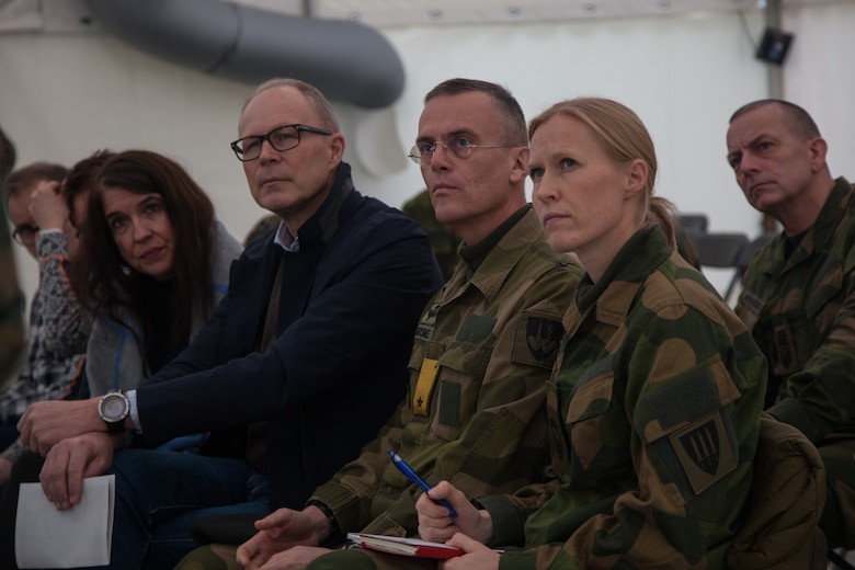 Norwegian military leaders listen to U.S. Marine speakers during a presentation in Stjødal, Norway, Nov. 5, 2018. Leaders of the Norwegian military met with leaders and noncommissioned officers (NCOs) of 2nd MLG-Fwd to discuss the role of the Marine Corps NCO during Exercise Trident Juncture 18. The exercise enhances the U.S. and NATO Allies’ and partners’ abilities to work together collectively to conduct military operations under challenging conditions. (U.S. Marine Corps photo by Lance Cpl. Scott R. Jenkins)