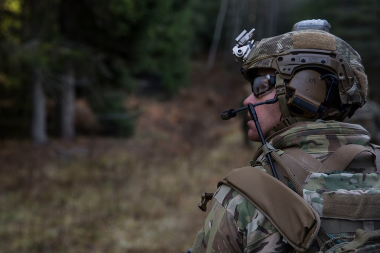 A British Royal Marine searches for a simulated isolated service member during a Tactical Recovery of Aircraft and Personnel (TRAP) exercise in Rindal, Norway, Nov. 6, 2018. The Royal Marines with X-Ray Company, 45 Commando, worked in conjunction with the 24th Marine Expeditionary Unit and assets from Marine Aircraft Group 29 to exercise their TRAP proficiency and bilateral interoperability during Exercise Trident Juncture 18. The exercise enhances the U.S. and NATO Allies’ and partners’ abilities to work together collectively to conduct military operations under challenging conditions. (U.S. Marine Corps photo by Cpl. Margaret Gale)