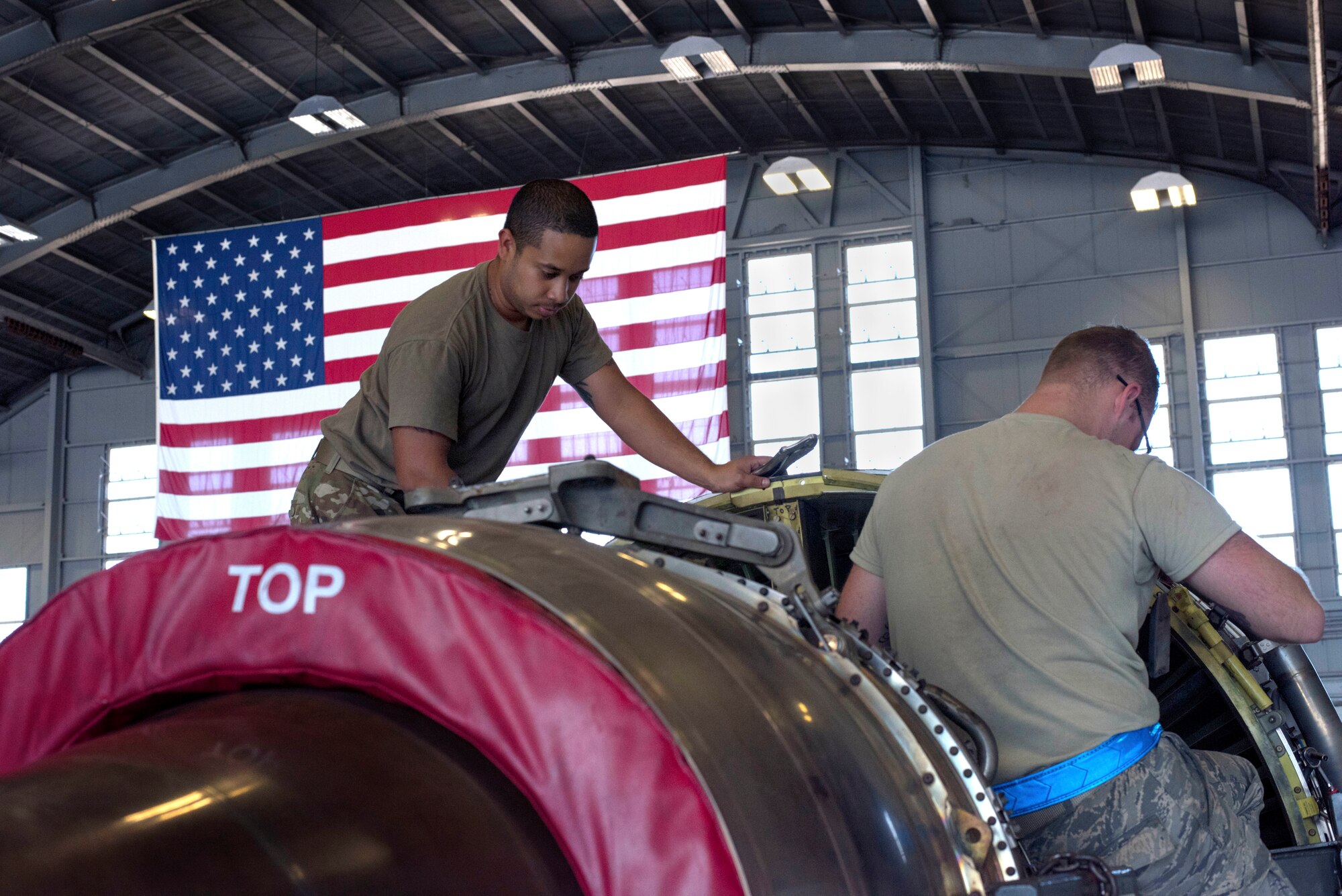 U.S. Air Force Staff Sgt. David Humphreys and Senior Airman Nathan Hiesterman, a 6th Aircraft Maintenance Squadron aerospace propulsion journeymen, inspect a KC-135 Stratotanker aircraft engine at MacDill Air Force Base, Fla., Nov. 6, 2018.