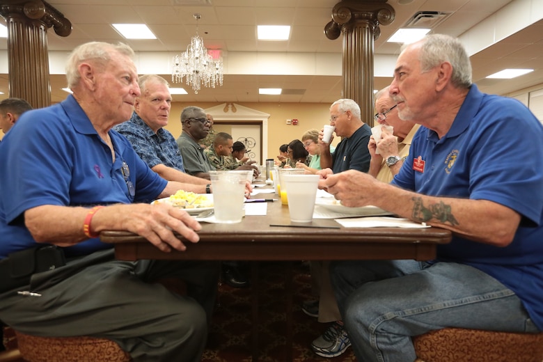 A Coast Guard veteran encouraged several of his military peers to take advantage of many programs offered by Veterans Administration during the monthly veterans breakfast at Marine Corps Logistics Base Albany, November 7. (U.S. Marine Corps photo by Re-Essa Buckels).