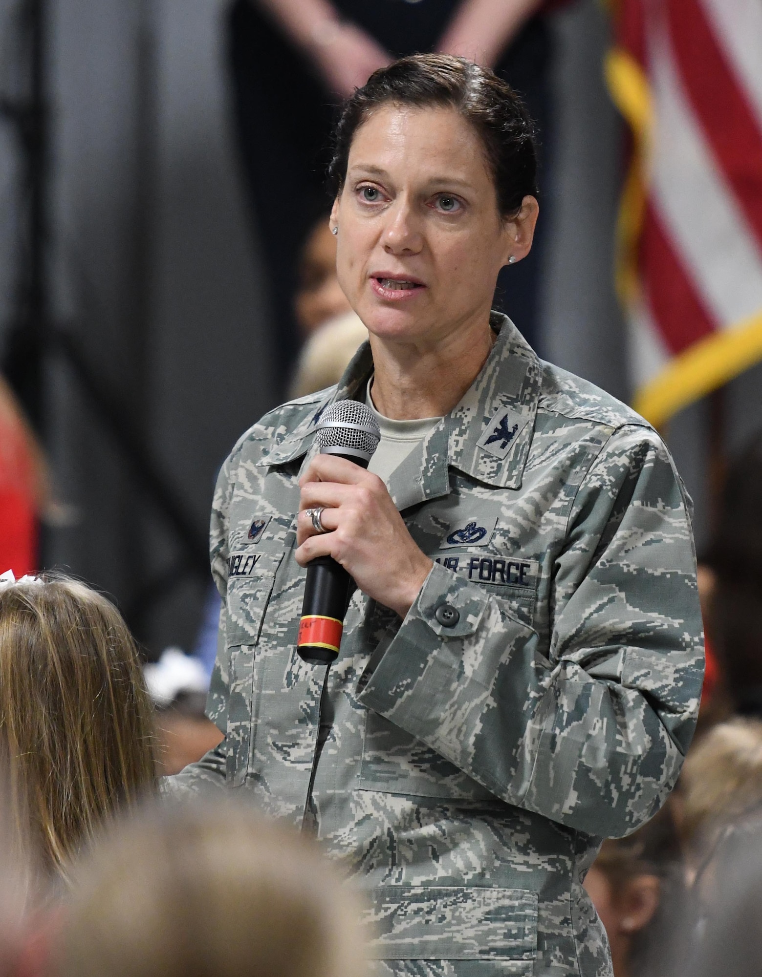 U.S. Air Force Col. Marcia Quigley, 81st Mission Support Group commander, delivers remarks during the Jeff Davis Elementary School Veterans Day celebration in Biloxi, Mississippi, Nov. 8, 2018. During the event, students recited the Pledge of Allegiance and sang several patriotic songs. Keesler Air Force Base leadership, honor guardsmen and base personnel attended the event. (U.S. Air Force photo by Kemberly Groue)