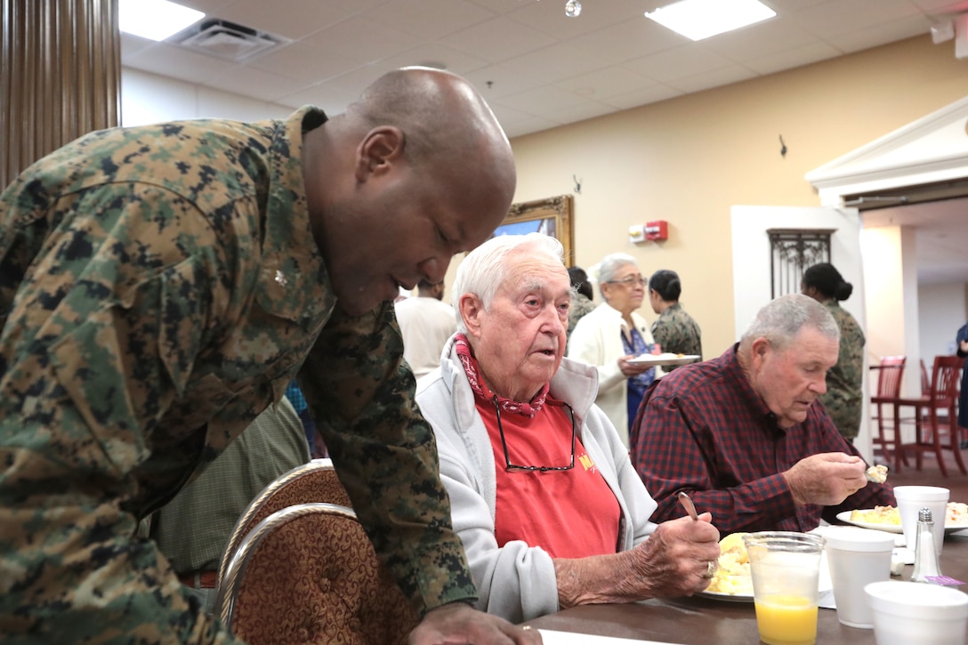 A Coast Guard veteran encouraged several of his military peers to take advantage of many programs offered by Veterans Administration during the monthly veterans breakfast at Marine Corps Logistics Base Albany, November 7. (U.S. Marine Corps photo by Re-Essa Buckels).