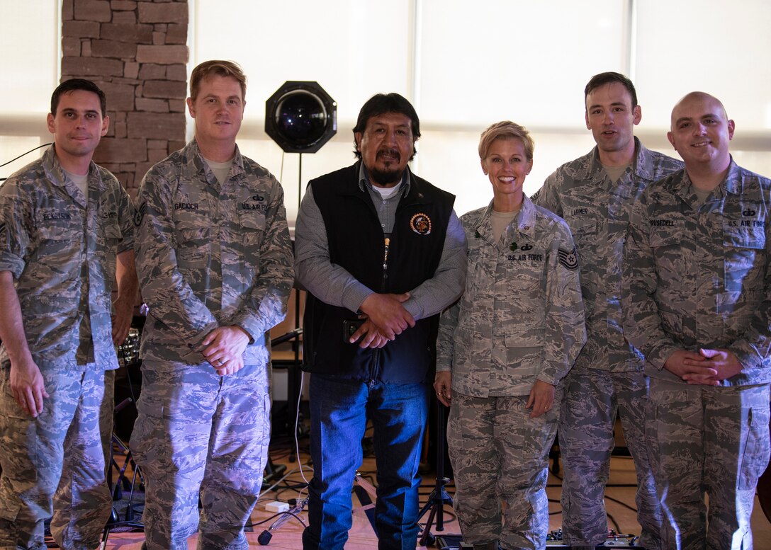 Members of Blue Steel pose with Thomas Moquino, Kewa Governor at Santo Domingo Elementary-Middle School, Kewa Pueblo, Oct. 24, 2018. Blue Steel toured local communities surrounding Kirtland to thank them for their support. (U.S. Air Force photo by Airman 1st Class Austin J. Prisbrey)