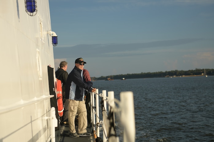 Paul Blaney, U.S. Coast Guard Academy class of 1965 alumnus, gazes out over the Charleston Harbor from the USCGC Cormorant Nov. 7, 2018, in Charleston, S.C. The ship’s crew took the class of 1965 on a tour of the Charleston Harbor during the 50-year anniversary of when they deployed to Vietnam. The class was deployed to Vietnam in 1968 where they patrolled the coast of the country during the conflict.