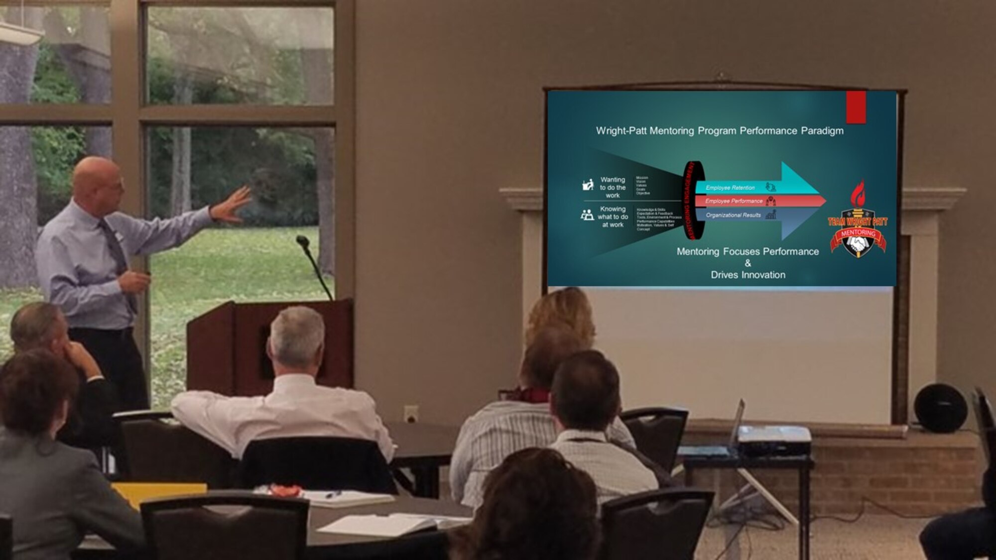 Dr. Tom Tirey explains the Team Wright-Patt Mentoring Program performance model Oct. 31 at the Twin Base golf course’s Jones Room. (Contributed photo)