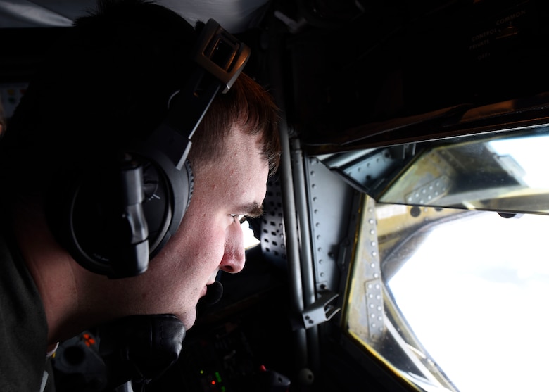U.S. Air Force Staff Sgt. Nick Lichtenwalner, 384th Air Refueling Squadron inflight refueling specialist, prepares to perform an inflight refueling mission in the U.S. Northwestern Region, Nov. 4, 2018. Team Fairchild's Human Performance Cell has created an initiative to provide inflight refueling specialists with tools to minimize strain and discomfort their bodies undergo while performing the mission. (U.S. Air Force photo/Airman 1st Class Lawrence Sena)