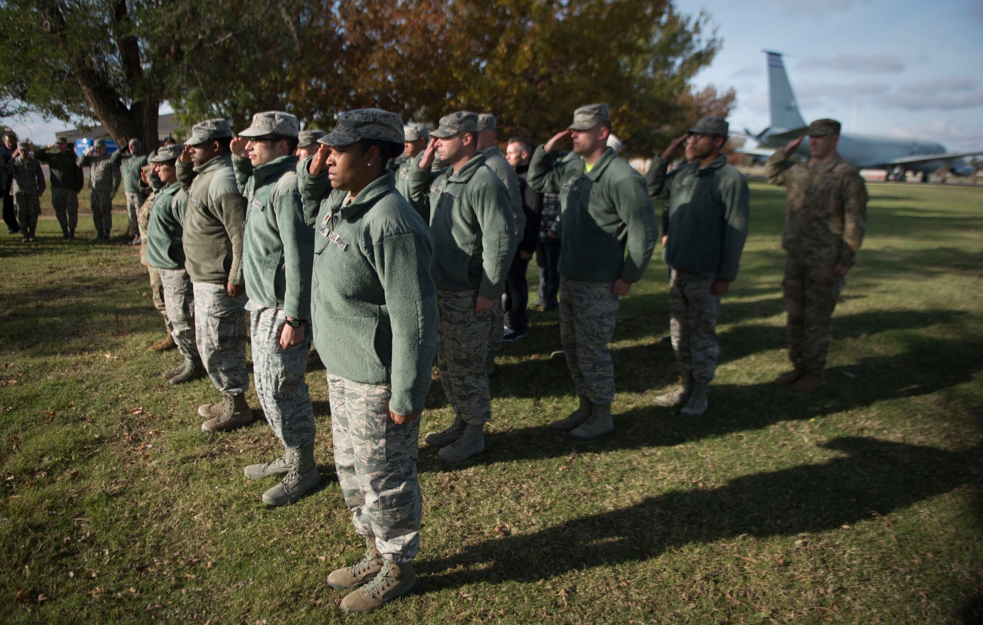 Maj. Marshalria Vaughans, commander of the 97th Communications Squadron, salutes during the playing of taps at a ceremony in honor of Staff Sgt. Andrew Bubacz, Nov. 11, 2018, Altus Air Force Base, Okla. The 97th CS has held a ceremony honoring Bubacz every year since 2010, who passed away in support of Operation Enduring Freedom.