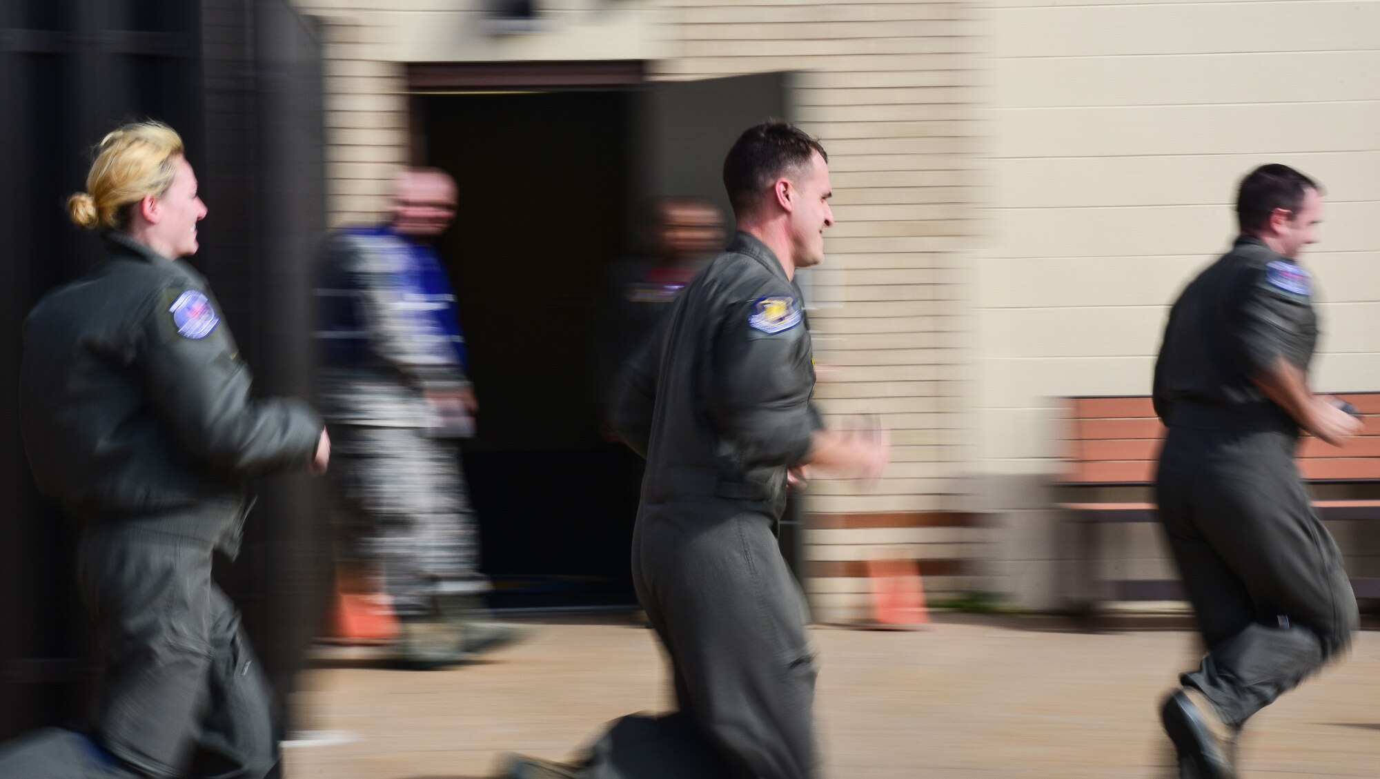 Team McConnell aircrew rush to alert vehicles during Global Thunder 19, Nov. 2, 2018, at McConnell Air Force Base, Kan. Global Thunder is an exercise to test readiness and ensure a safe, secure, ready and reliable strategic deterrent force. The annual exercise is based on a notional scenario developed to drive execution of U.S. Strategic Command and component forces' ability to support the geographic combatant commands, deter adversaries and, if necessary, employ forces as directed by the President of the United States. (U.S. Air Force photo by Airman 1st Class Alan Ricker)