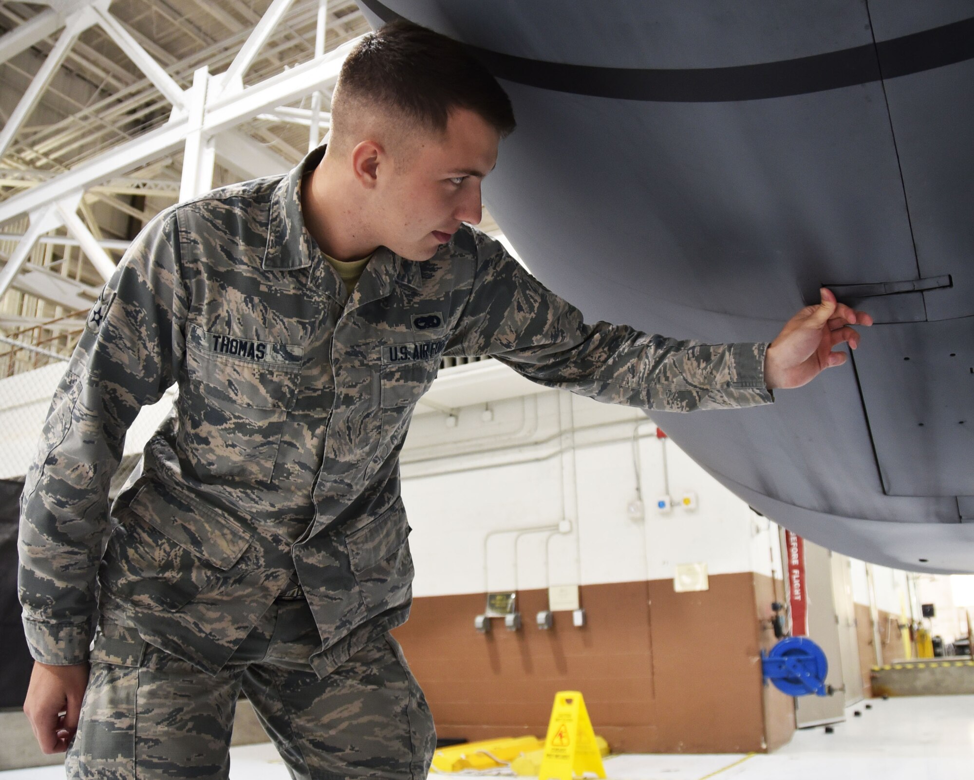 Senior Airman Taner Thomas, 931st Aircraft Maintenance Squadron  electrical and environmental journeyman, inspects a KC-135 Stratotanker static Nov. 3, 2018, McConnell Air Force Base, Kan. The Reserve Citizen Airman recently graduated McConnell's Airman Leadership School, and became the recipient of the John L. Levitow Award.