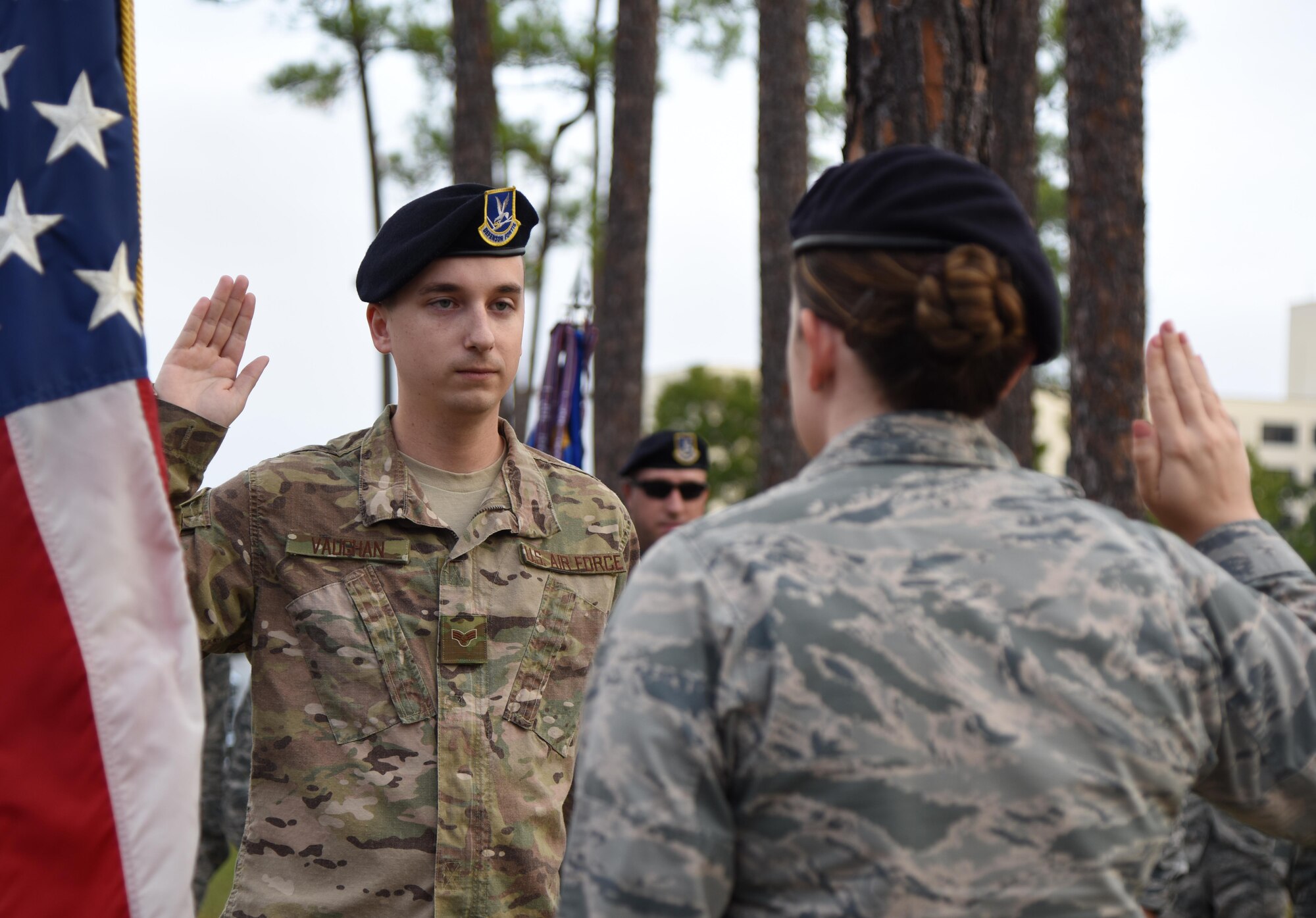 U.S. Air Force Capt. Samantha Giebel, 81st Security Forces Squadron operations officer, delivers the oath of enlistment to Senior Airman James Vaughan IV, 81st SFS unit trainer, at Keesler Air Force Base, Mississippi, Nov. 9, 2018. Vaughan reenilisted prior to the 81st SFS Veterans Day Ruck March, which was held in honor of all veterans and victims of war. (U.S. Air Force photo by Kemberly Groue)