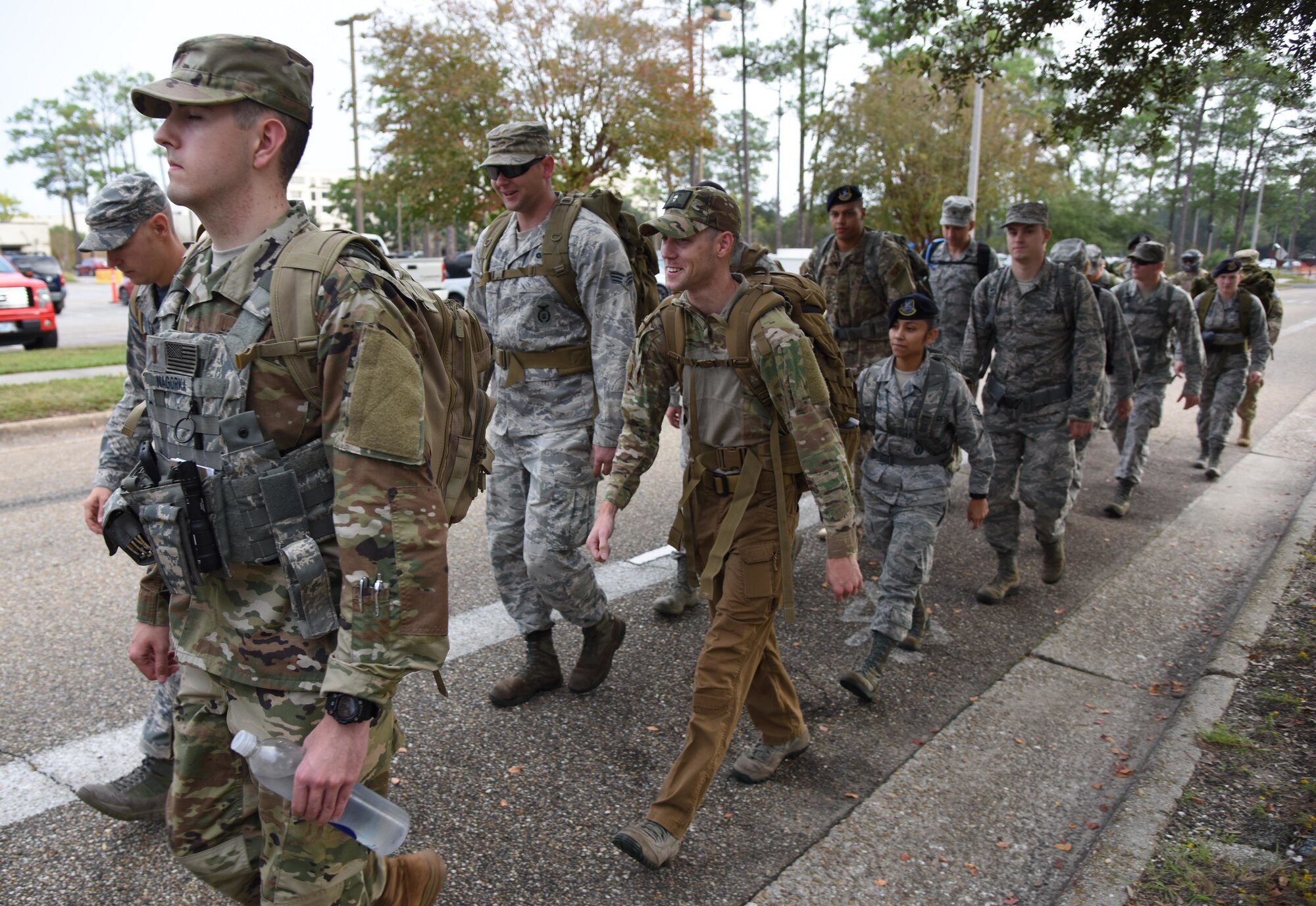 Members of the 81st Security Forces Squadron participate in the 81st SFS Veterans Day Ruck March at Keesler Air Force Base, Mississippi, Nov. 9, 2018. The 6.8 mile ruck march was held in honor of all veterans and victims of war. (U.S. Air Force photo by Kemberly Groue)