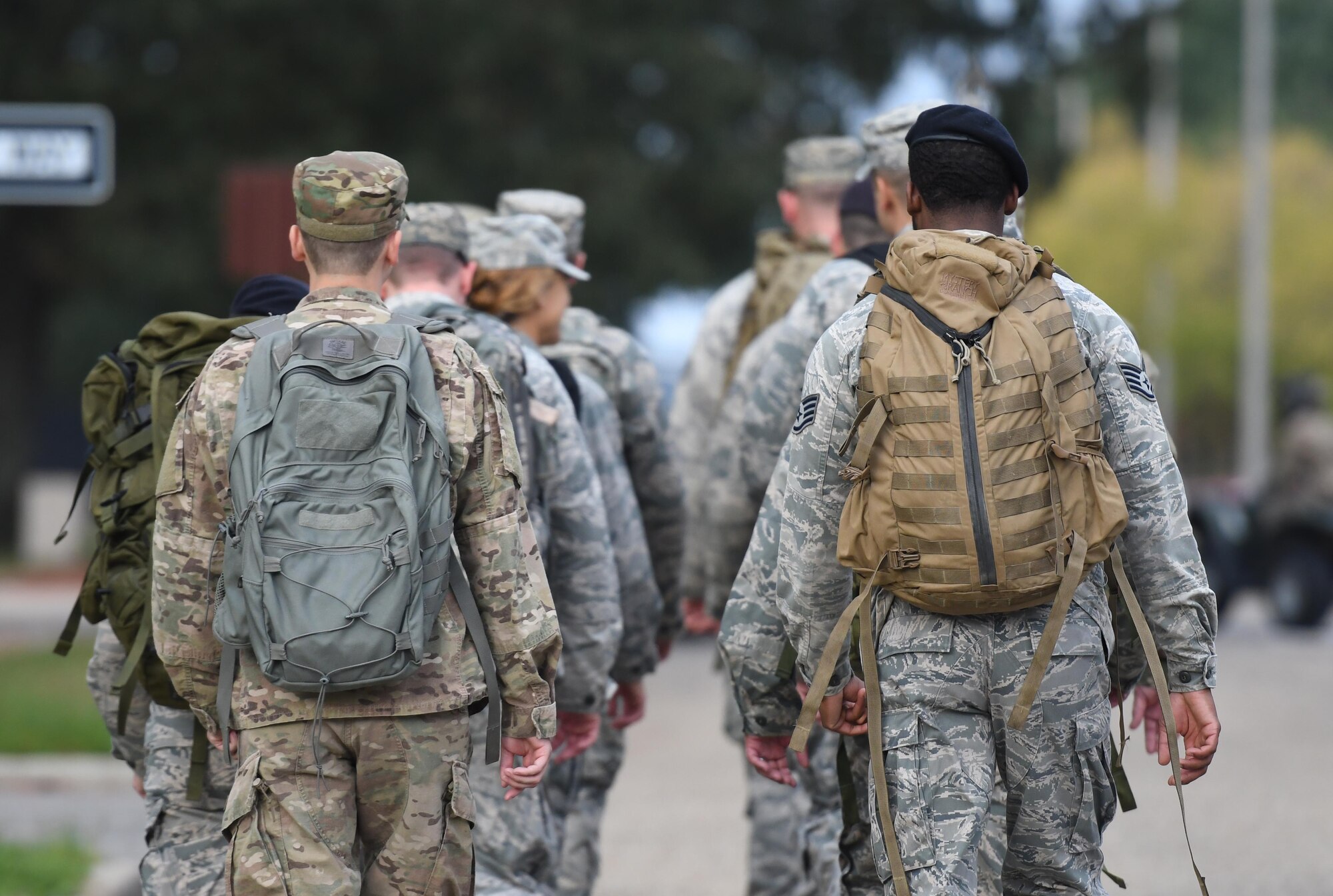 Members of the 81st Security Forces Squadron participate in the 81st SFS Veterans Day Ruck March at Keesler Air Force Base, Mississippi, Nov. 9, 2018. The 6.8 mile ruck march was held in honor of all veterans and victims of war. (U.S. Air Force photo by Kemberly Groue)