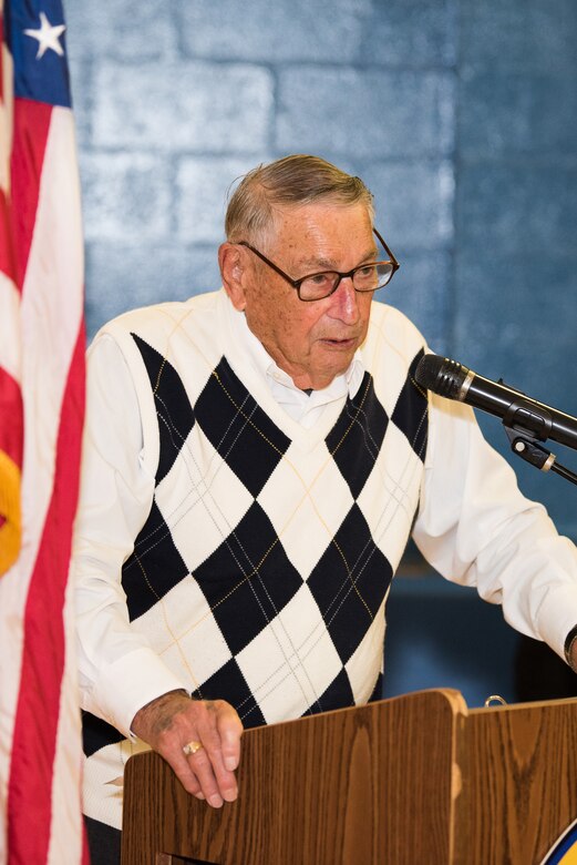 Retired U.S. Air Force Master Sgt. Leo Tos speaks to a crowd of students, parents and faculty during a Veterans Day celebration Nov. 9, 2018, at Dover Air Force Base Middle School, Dover Air Force Base, Del. Tos served 22 years of honorable military service in three different branches, spanning three wars. (U.S. Air Force photo by Mauricio Campino)