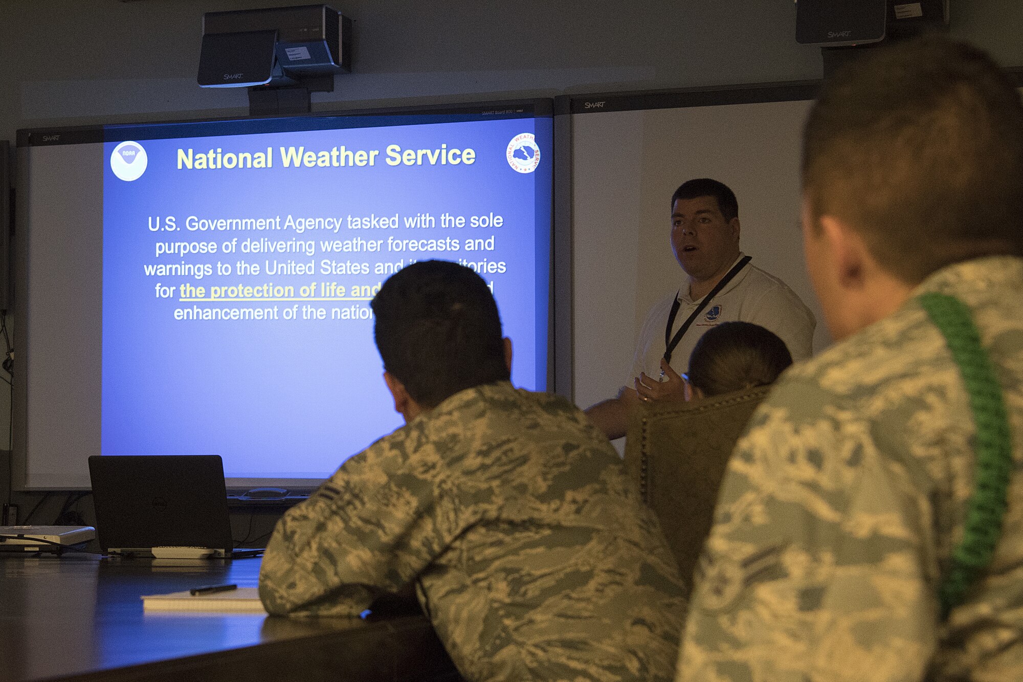 Keesler 335th Training Squadron weather students listen to a SkyWarn Program briefing by Phil Grigsby, National Weather Service forecaster, inside the Weather Training Complex at Keesler Air Force Base, Mississippi, Nov. 2, 2018. The program is a partnership between the National Weather Service and the 81st Training Wing, which certifies the weather students to be official storm spotters. (U.S. Air Force photo by Airman 1st Class Suzie Plotnikov)