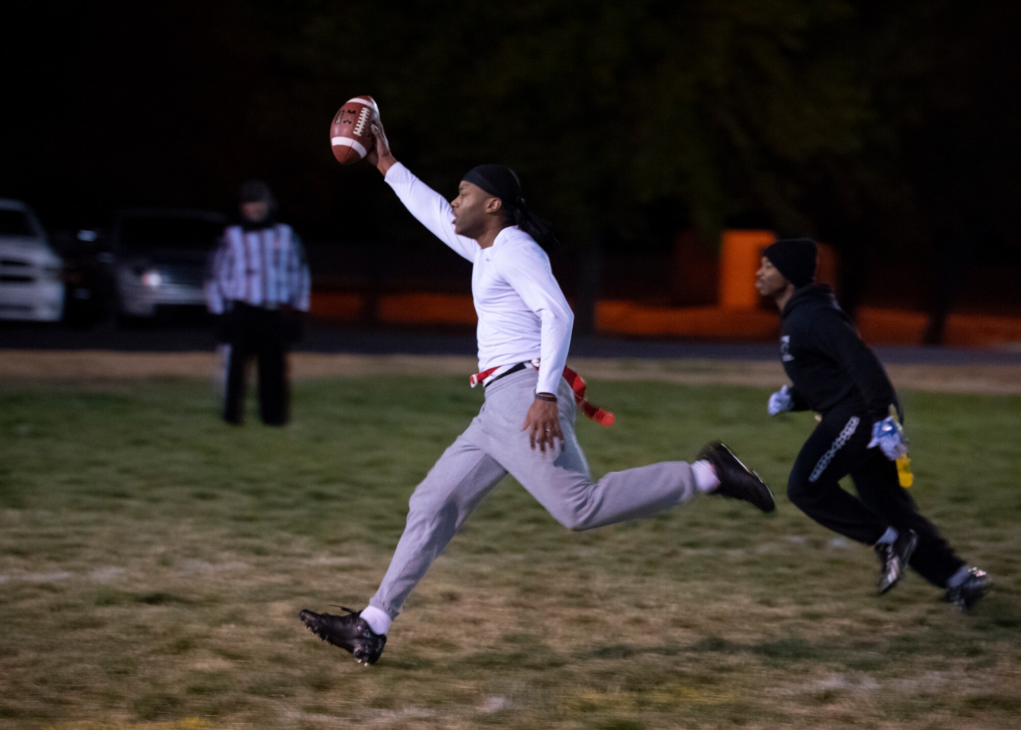 Senior Airman Damion Johnson, SF Sykes lineman, celebrates while scoring a touchdown during the 2018 intramural flag football championship at Kirtland Air Force Base, N.M., Nov. 8. (U.S. Air Force photo by Staff Sgt. J.D. Strong II)
