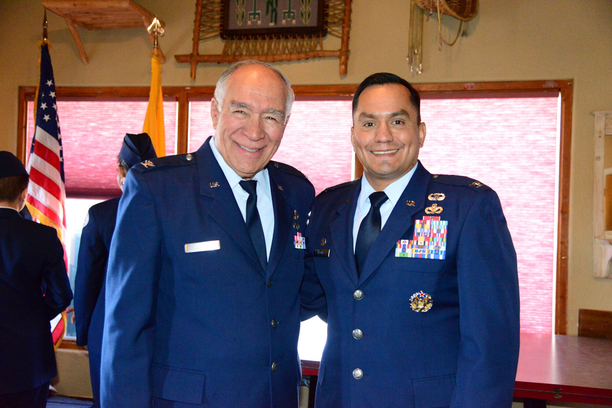 The mayor of Los Ranchos de Albuquerque and retired Air Force Col. Donald T. Lopez (left), poses with Col. Juan Alvarez, 377th Mission Support Group commander, at Sadie's Restaruant in Los Ranchos Oct. 9. Kirtland Airmen attended a luncheon there to honor a group of veterans, and festivities included remarks by Lopez and Alvarez. The event was also supported with a presentation of the colors by the Valley High School JROTC, honoring veterans past and present. (U.S. Air Force photo by Jessie Perkins)