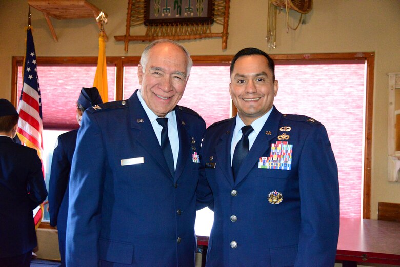 The mayor of Los Ranchos de Albuquerque and retired Air Force Col. Donald T. Lopez (left), poses with Col. Juan Alvarez, 377th Mission Support Group commander, at Sadie's Restaruant in Los Ranchos Oct. 9. Kirtland Airmen attended a luncheon there to honor a group of veterans, and festivities included remarks by Lopez and Alvarez. The event was also supported with a presentation of the colors by the Valley High School JROTC, honoring veterans past and present. (U.S. Air Force photo by Jessie Perkins)