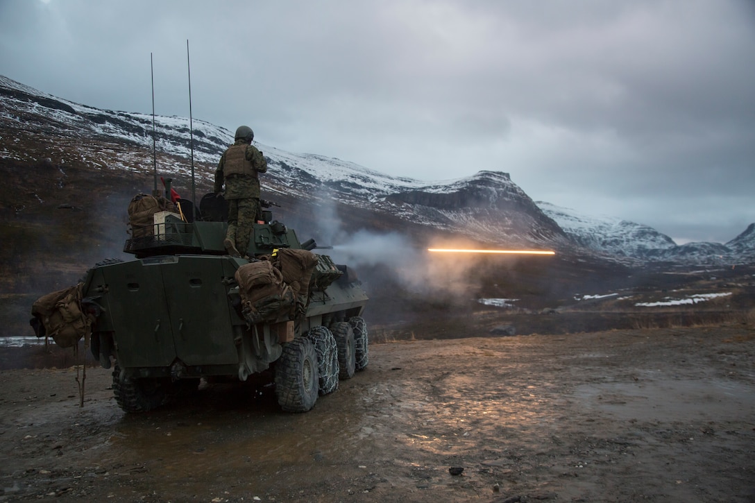 U.S. Marines with Marine Rotational Force-Europe 19.1 fire rounds from a Light Armored Vehicle during Exercise Northern Screen at Setermoen, Norway, Nov. 5, 2018. The exercise increases the Marines’ proficiency in cold-weather, arctic, and mountainous environments.