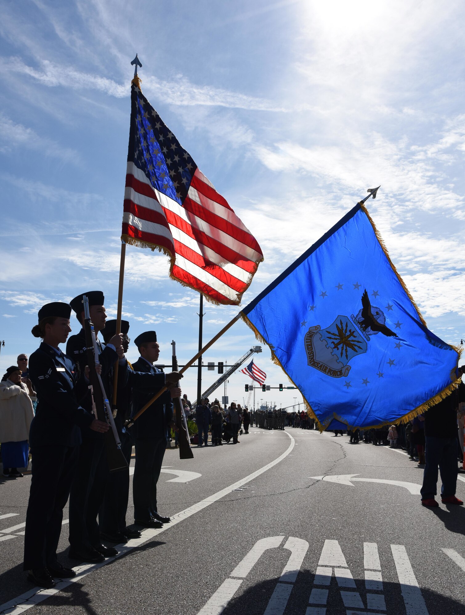 The Keesler Honor Guard presents the colors during the Mississippi Gulf Coast Veterans Parade in Gulfport, Mississippi, Nov. 10, 2018. Keesler Air Force Base leadership along with hundreds of Airmen attended and participated in the parade in support of all veterans past and present. More than 70 unique floats, marching bands and military units marched in the largest Veterans Day parade on the Gulf Coast. (U.S. Air Force photo by Kemberly Groue)