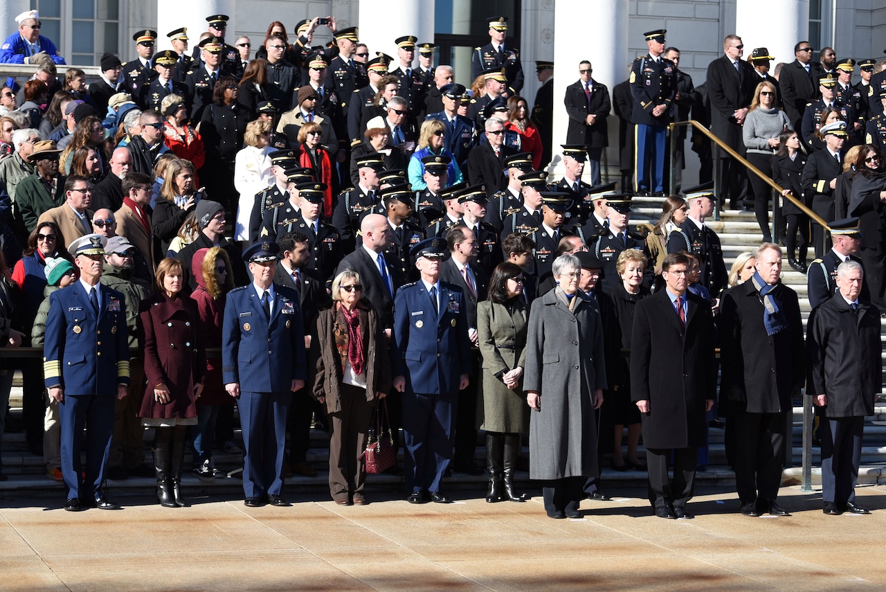 Defense Secretary James N. Mattis and Deputy Defense Secretary Patrick M. Shanahan stand with military leaders at Arlington Nationial Cemetery
