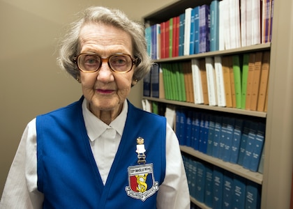 Helen Wells, a 94-year-old assistant library volunteer for the 59th Medical Wing, poses for a photo in the Wilford Hall Ambulatory Surgical Center medical library. Wells has dedicated more than 50 years of service to the United States Air Force. (U.S. Air Force photo by Staff Sgt. Kevin Iinuma)