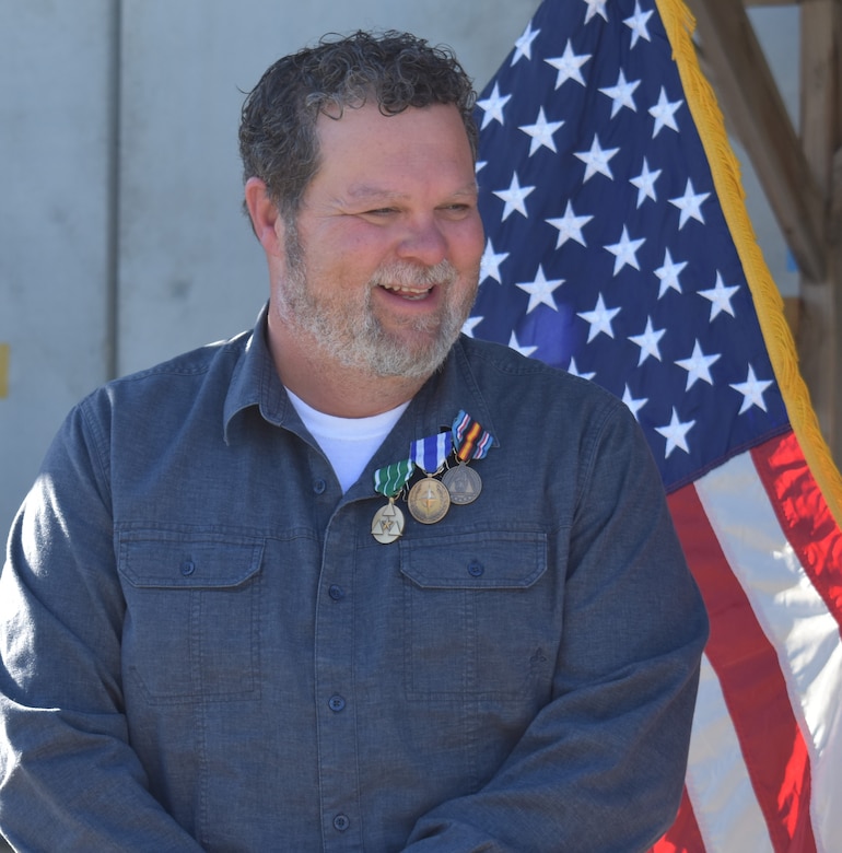Terry “Hawk” Hawkins proudly wears the acknowledgement of his volunteer service overseas supporting the mission in Afghanistan. His infectious smile shined, as he did, throughout his selfless service.