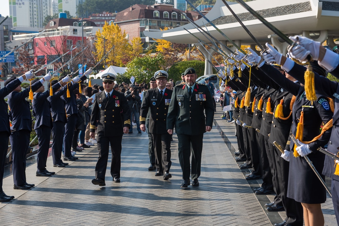 assigned to the United Nations Command, arrive at the UN Memorial Cemetery in Korea (UNMCK) for the Turn Towards Busan Ceremony. Turn Towards Busan is a ceremony held annually on November 11 at UNMCK to honor UN Sending States service members both living and deceased who fought in the Korean War. (U.S. Navy photo by Mass Communication Specialist 3rd Class William Carlisle)