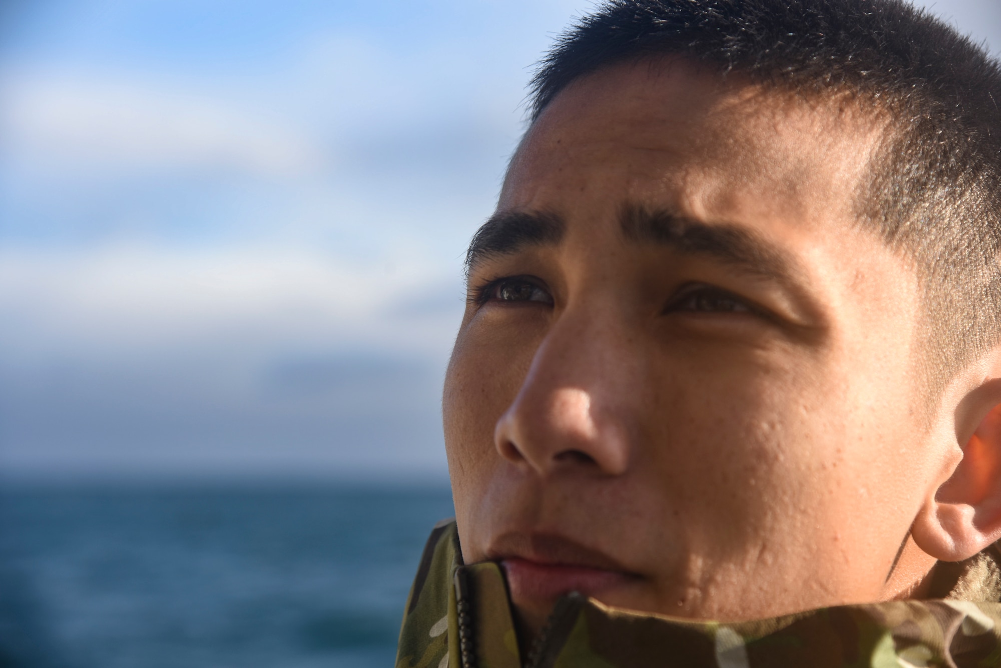 U.S. Air Force Staff Sgt. Sean Cruz, a 31st Rescue Squadron aircrew flight equipment technician, talks with his team members during a combat search and rescue training exercise during exercise Keen Sword 19, near Misawa Air Base, Japan, Oct. 31, 2018. More than 20 personnel participated in the CSAR training to ensure all members stayed qualified, if pilots ever needed their specialized skillsets. Exercises like Keen Sword provide the Japan Self-Defense Force and U.S. military opportunities to train together across a variety of mission areas in realistic scenarios, enhancing readiness and interoperability. (U.S. Air Force photo by Senior Airman Sadie Colbert)