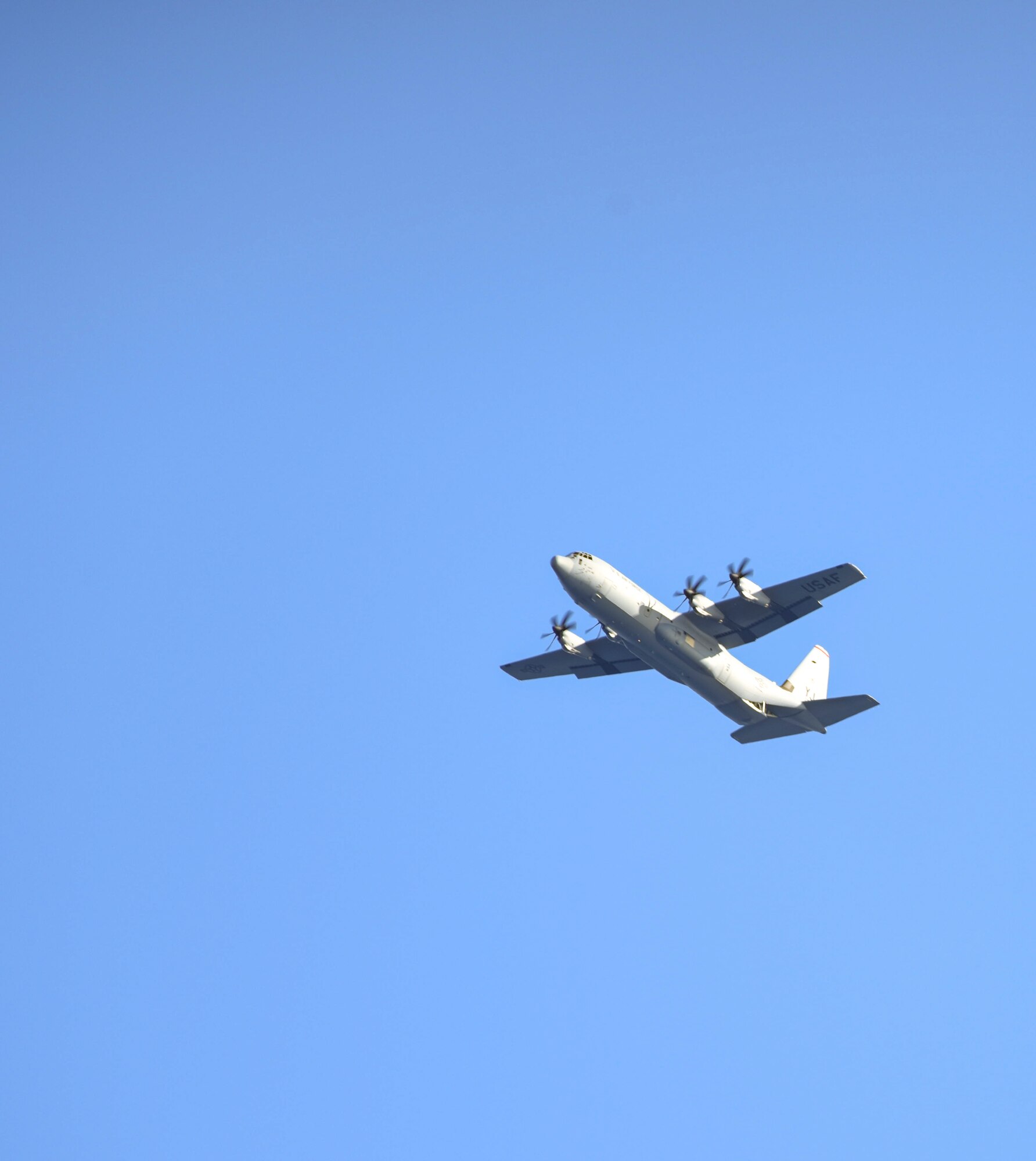 A U.S. Air Force C-130J Super Hercules from Yokota Air Base, Japan, lowers its ramp for a combat search and rescue training operation during exercise Keen Sword 19, near Misawa Air Base, Japan, Oct. 31, 2018. During the simulation, parascue specialists with the 31st Rescue Squadron out of Kadena Air Base, Japan, jumped out of the aircraft and made their way to shore to begin their CSAR mission. They later practiced locating and safely evacuating a simulated downed pilot, ensuring they stay up-to-date in their certifications. (U.S. Air Force photo by Senior Airman Sadie Colbert)