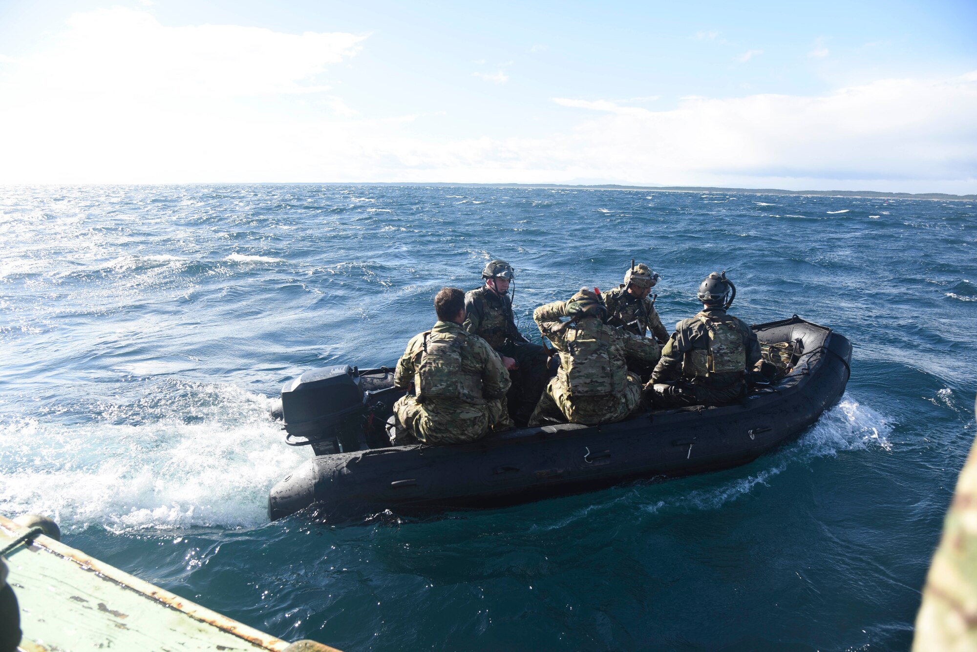 U.S. Air Force pararescue specialists with the 31st Rescue Squadron from Kadena Air Base, Japan, deploy a rescue boat for a combat search and rescue training mission during exercise Keen Sword 19, near Misawa Air Base, Japan, Oct. 19, 2018. Approximately 10,000 U.S. service members participated in KS19 from units including the U.S. Pacific Fleet, U.S. Forces Japan, 7th Fleet, 5th Air Force, 374th Airlift Wing, 18th Wing, 35th Fighter Wing and III Marine Expeditionary Force. Exercises like Keen Sword provide the Japan Self-Defense Force and U.S. military opportunities to train together across a variety of mission areas in realistic scenarios, enhancing readiness and interoperability. (U.S. Air Force photo by Senior Airman Sadie Colbert)
