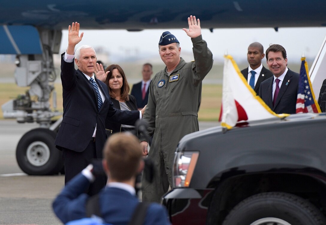 United States Vice President Michael R. Pence, Second Lady Karen Pence, and Lt. Gen. Jerry Martinez, United States Forces Japan and 5th Air Force commander, wave to a crowd at Yokota Air Base