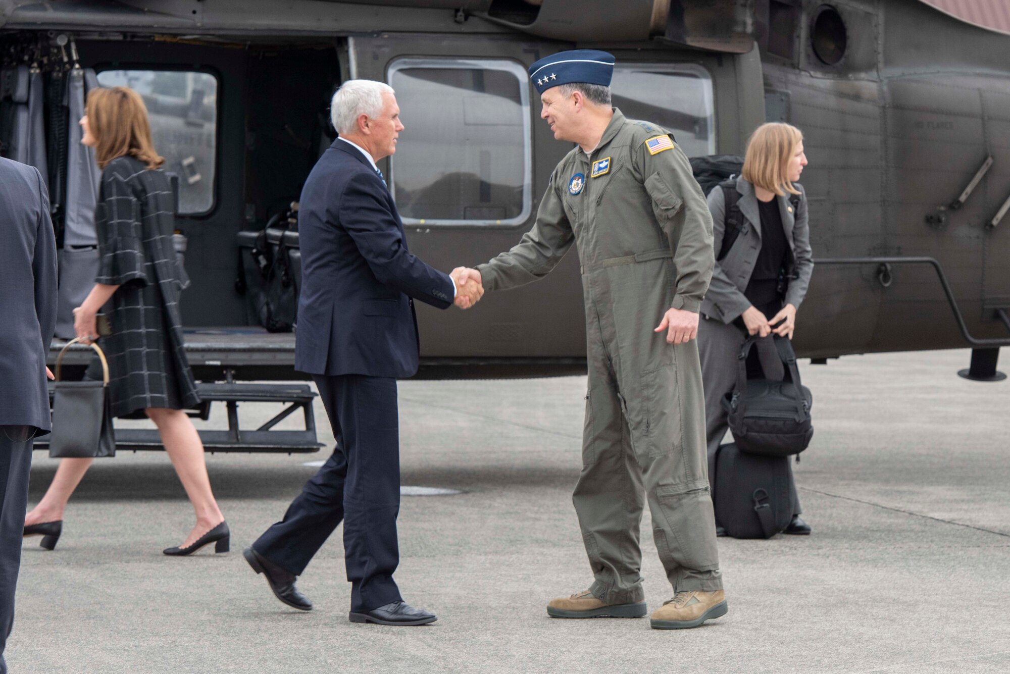 Vice President of the United States Michael R. Pence shakes hands with Lt. Gen. Jerry P. Martinez, U.S. Forces Japan and 5th Air Force commander, after arriving at Yokota Air Base, Japan, Nov. 13, 2018.