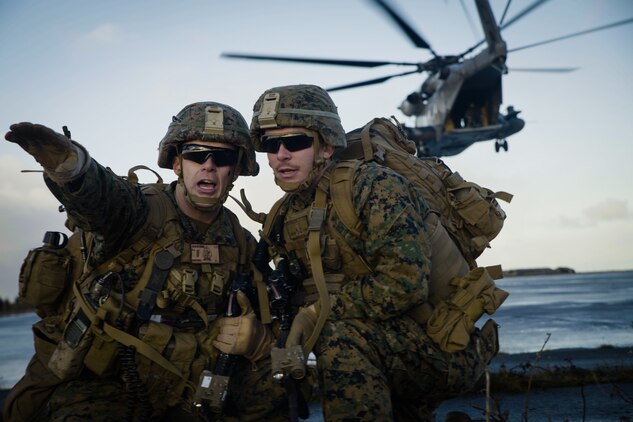 U.S. Marines secure a landing strip after disembarking from Marine Corps CH-53E Super Stallion during air assault training at Keflavik Air Base, Iceland, Oct. 17, 2018, during Exercise Trident Juncture 18.Trident Juncture training in Iceland promoted key elements of preparing Marines to conduct follow-on training in Norway in the later part of the exercise.