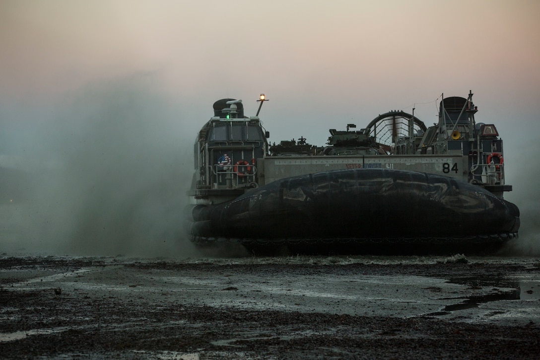 A landing craft air cushion lands on Alvund Beach, Norway during an amphibious landing in support of Trident Juncture 18, Oct. 30, 2018. Trident Juncture provides a unique and challenging environment for Marines and Sailors to rehearse their amphibious capabilities which will result in a more ready and proficient fighting force. The LCACs originated from USS New York and showcased the ability of the Iwo Jima Amphibious Ready Group and the 24th Marine Expeditionary Unit to rapidly project combat power ashore.