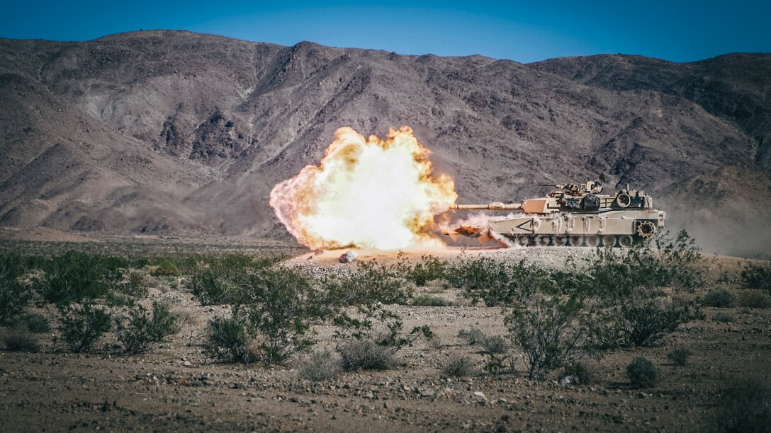 An M1A1 Abrams Main Battle Tank with Battalion Landing Team 3rd Battalion, 5th Marine Regiment, 11th Marine Expeditionary Unit, fires its main gun during a predeployment training exercise at Marine Corps Air Ground Combat Center Twentynine Palms, Calif., Nov. 9, 2018. Darkhorse is preparing for deployment as the ground combat element of the 11th MEU, next year.