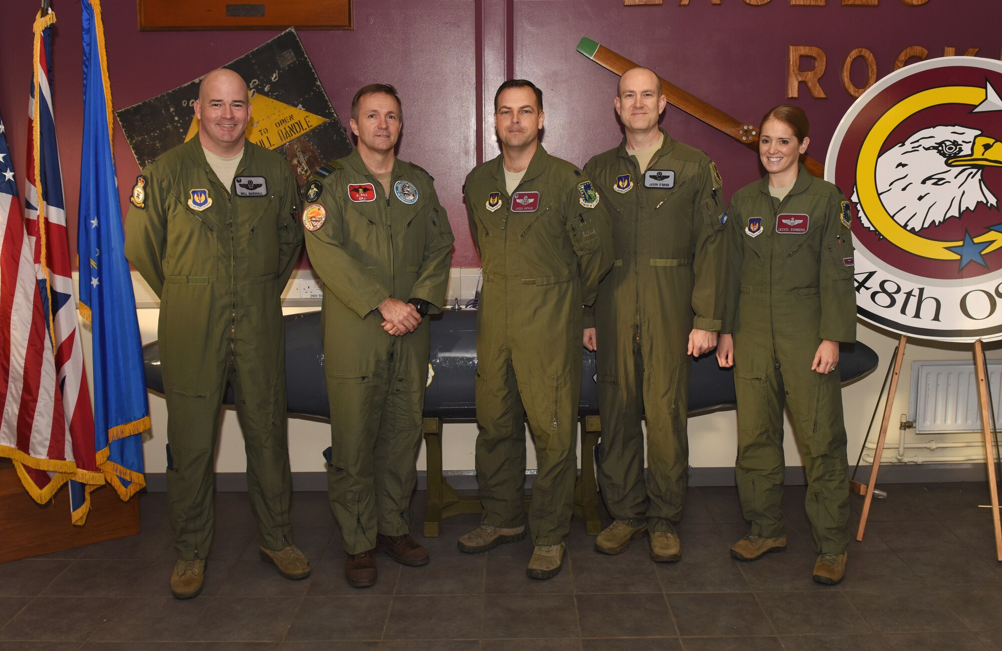U.S. Air Force Col. William Marshall, 48th Fighter Wing commander, poses with Royal Danish Air Force Chief of Air Staff Maj. Gen. Anders Rex and members of the 48th Operations Group, during a base visit at Royal Air Force Lakenheath, England, on Nov. 5, 2018. Maj. Gen. Rex toured the Liberty Wing flightline and observed support to live mission operations. (U.S. Air Force photo by Staff Sgt. Alex Echols)