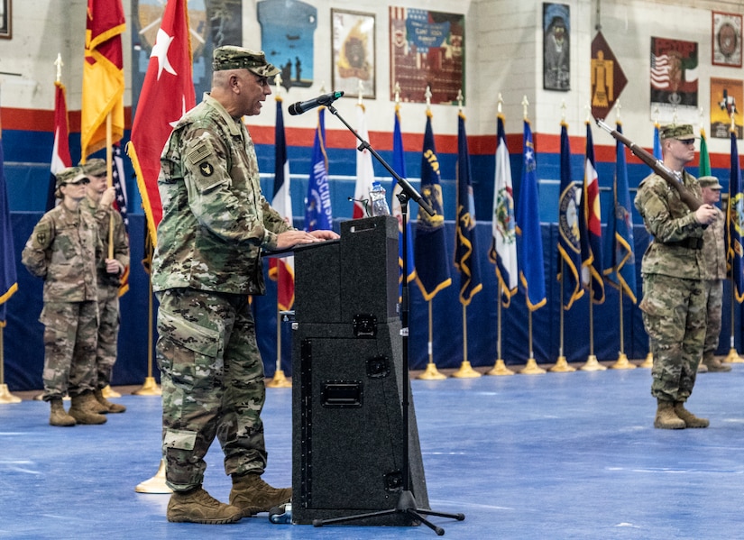 Maj. Gen. Benjamin Corell, 34th Red Bull Infantry Division commanding general and Command Sgt. Maj. Joseph Hjelmstad uncase the Division colors during a transfer of authority ceremony Nov. 12, 2018. The Minnesota National Guard unit's headquarters and headquarters battalion assumed responsibility for the Task Force Spartan mission to from the Pennsylvania National Guard's 28th Infantry Division. The 34th's HHBN is serving as a division headquarters for roughly 10,000 Soldiers conducting theater security operations in the Middle East.