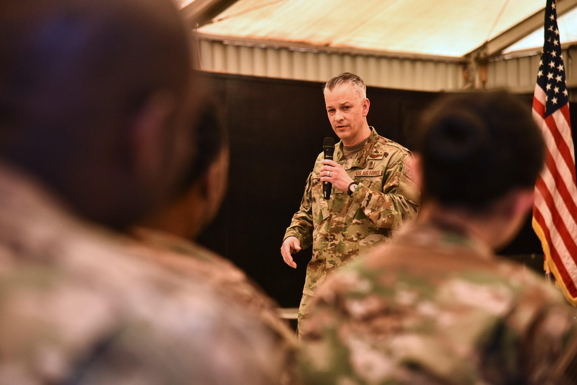 U.S. Air Force Chief Master Sgt. Steven Cum, Chief of Medical Enlisted Force and Enlisted Corps Chief, speaks to the 380th Expeditionary Medical Group at Al Dhafra Air Base, United Arab Emirates, Nov. 11, 2018. Cum is the personal advisor to the USAF Surgeon General on all issues regarding the welfare, readiness, morale, and proper utilization and progression for the 34,000 total force medical enlisted community. (U.S. Air Force photo by Senior Airman Mya M. Crosby)