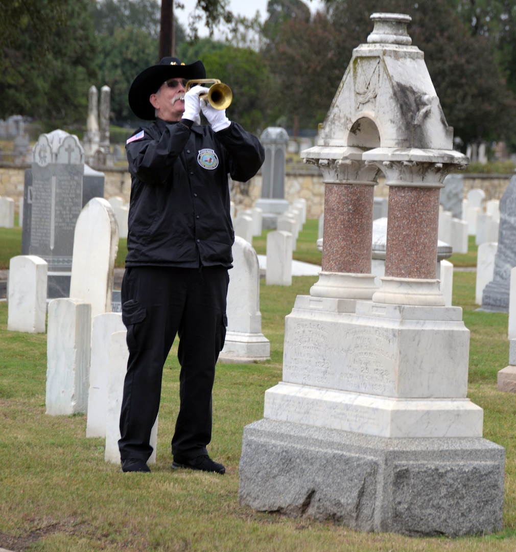 A bugler from the Fort Sam Houston Memorial Services Detachment plays "Taps" at the conclusion of the annual Bexar County Buffalo Soldiers Commemorative Ceremony at the San Antonio National Cemetery Nov. 11. Comprised of former slaves, freed men and Black Civil War veterans, the historic Buffalo Soldiers persevered through the most difficult conditions imaginable to become some of the most elite and most decorated units in the U.S. Army.