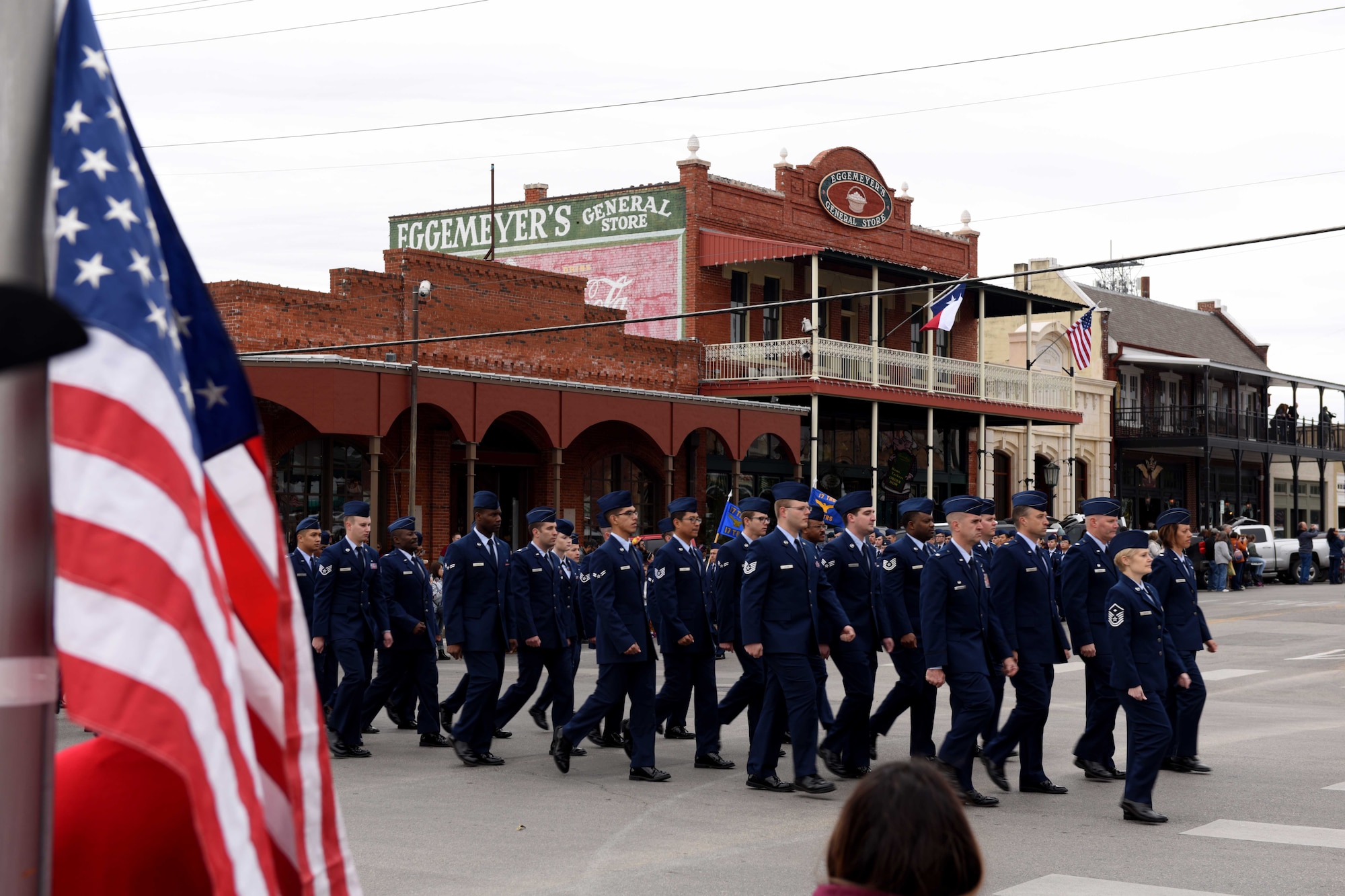 Airmen from the 17th Medical Group march in the Veterans Day Parade in San Angelo, Texas, Nov. 10, 2018. The parade featured veterans, active duty members and marching bands. (U.S. Air Force photo by Senior Airman Randall Moose/Released)