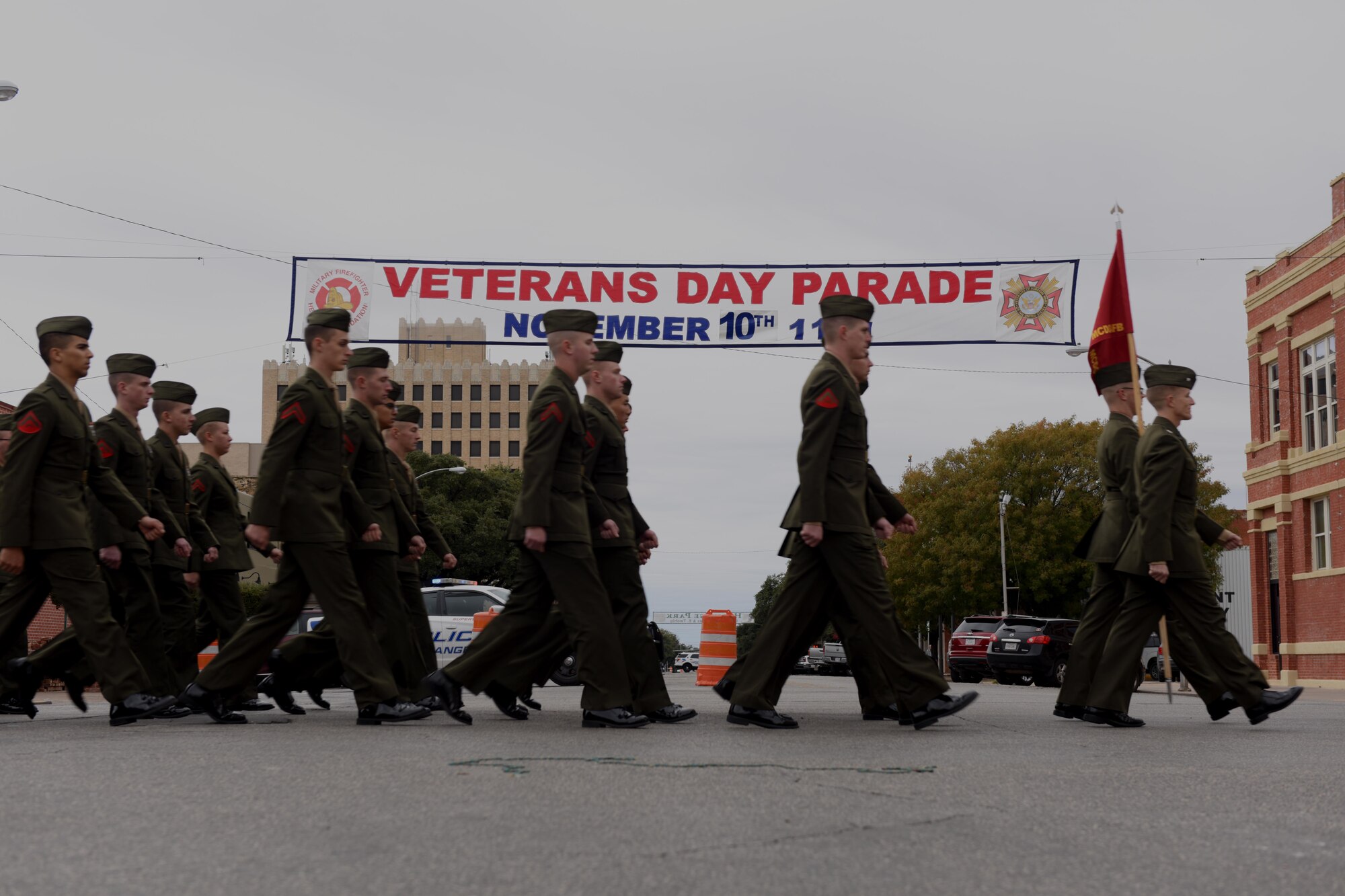 Marines from the Marine Corps Detachment at Goodfellow Air Force Base march in the Veterans Day Parade in San Angelo, Texas, Nov. 10, 2018. The parade represented each branch of the U.S. Armed Forces. (U.S. Air Force photo by Senior Airman Randall Moose/Released)