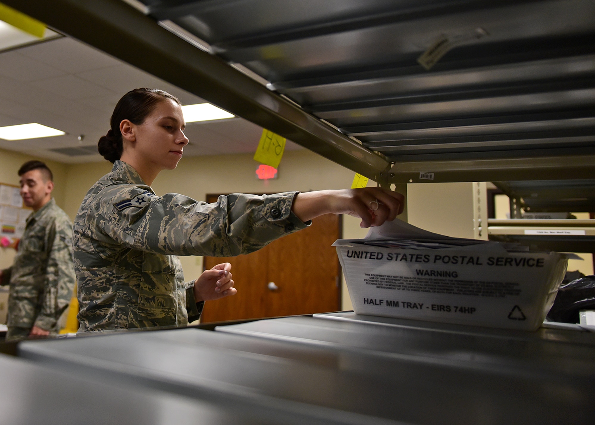 U.S. Air Force Airman 1st Class Isabella Opichka, 325th Force Support Squadron official mail technician, sorts official mail at Tyndall Air Force Base, Fla., Nov. 12, 2018. Opichka and fellow technicians returned two weeks after Hurricane Michael struck Tyndall and have been working to restore mail delivery across the installation. (U.S. Air Force photo by Senior Airman Isaiah J. Soliz)