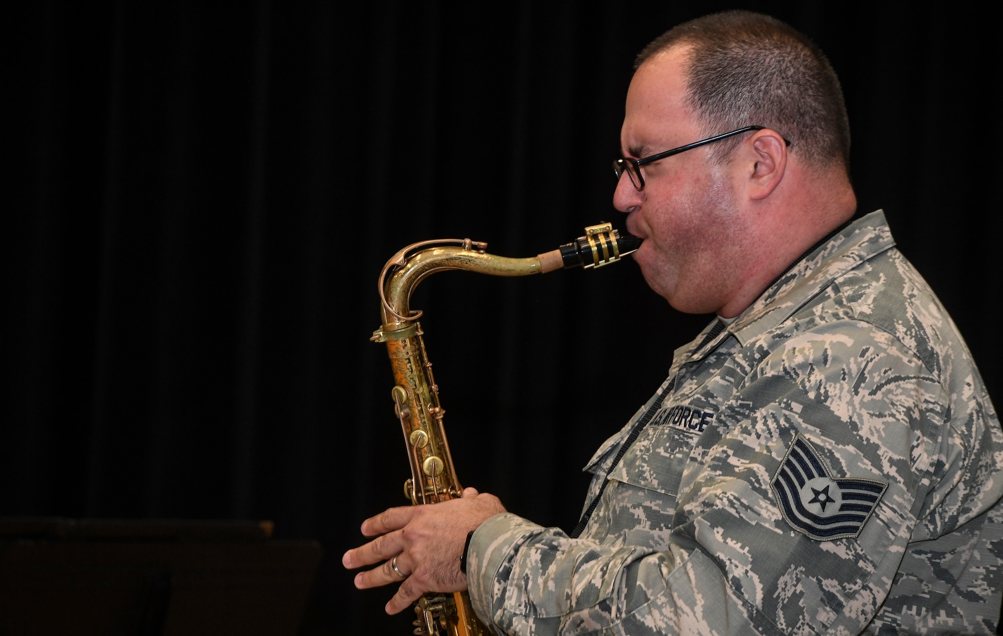Tech. Sgt. David Fatek, Rhythm in Blue tenor saxophone player, plays during a training session at Joint Base Langley-Eustis, Va., Oct. 26, 2018. The Air Force has 17 bands that each operate within their own geographic area of responsibility. They have a mission to represent America's Airmen to a global audience, and to tell the Air Force story by performing and engaging diverse audiences, political figures and decision makers around the globe. (U.S. Air Force photo by Tech. Sgt. Nick Wilson)