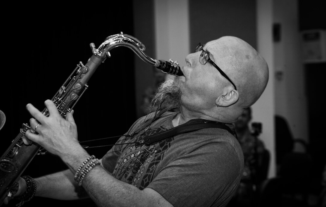 Grammy Award-winning musician Jeff Coffin plays the tenor saxophone during a training session at Joint Base Langley-Eustis, Virginia, Oct. 26, 2018. Coffin is internationally recognized as a member of the Dave Matthews rock band and is also a five-time Grammy Award winning saxophonist, composer and author.  (U.S. Air Force photo by Tech. Sgt. Nick Wilson)