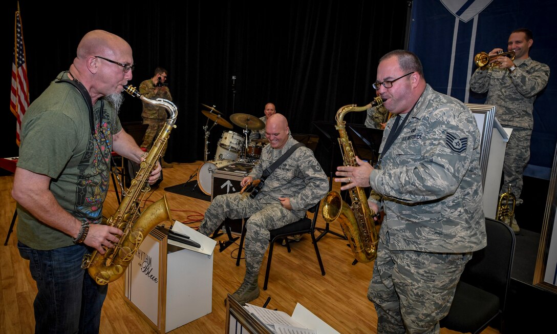 Grammy Award-winning saxophonist Jeff Coffin plays with U.S. Air Force Tech. Sgt. David Fatek, Rhythm in Blue tenor saxophone player, during a training session at Joint Base Langley-Eustis, Virginia, Oct. 26, 2018. The Rhythm in Blue jazz band has a mission to communicate U.S. Air Force and Department of Defense messages by making lasting connections with their audiences. (U.S. Air Force photo by Tech. Sgt. Nick Wilson)